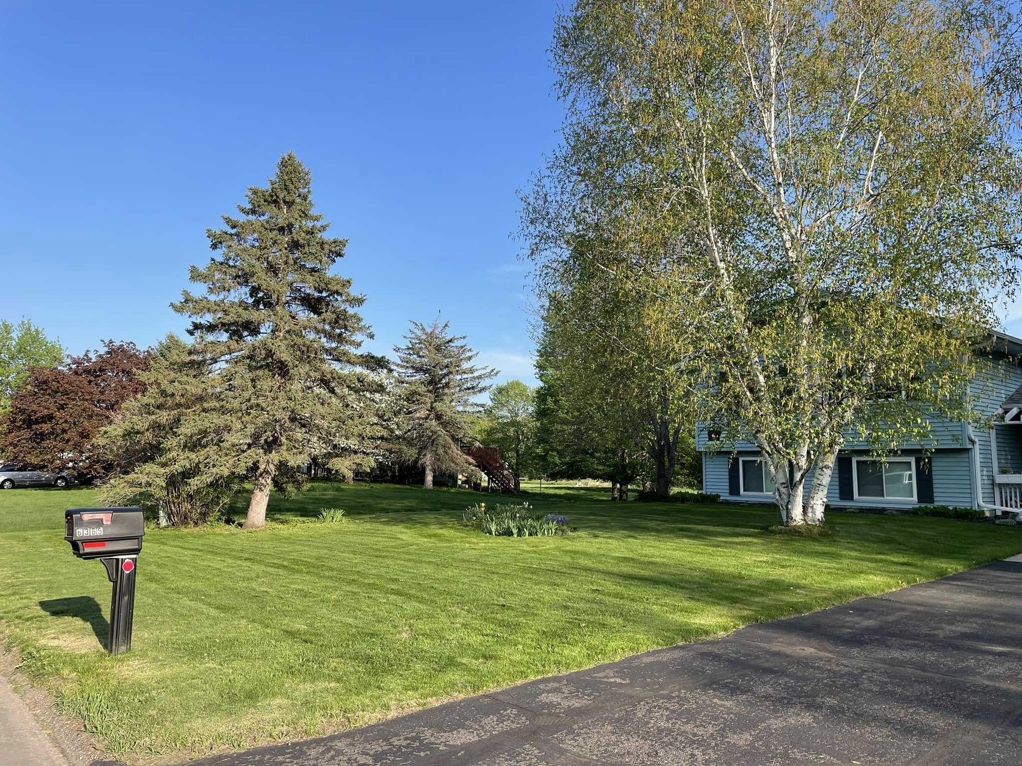 Well-maintained suburban residential lawn in Chisago County Minnesota